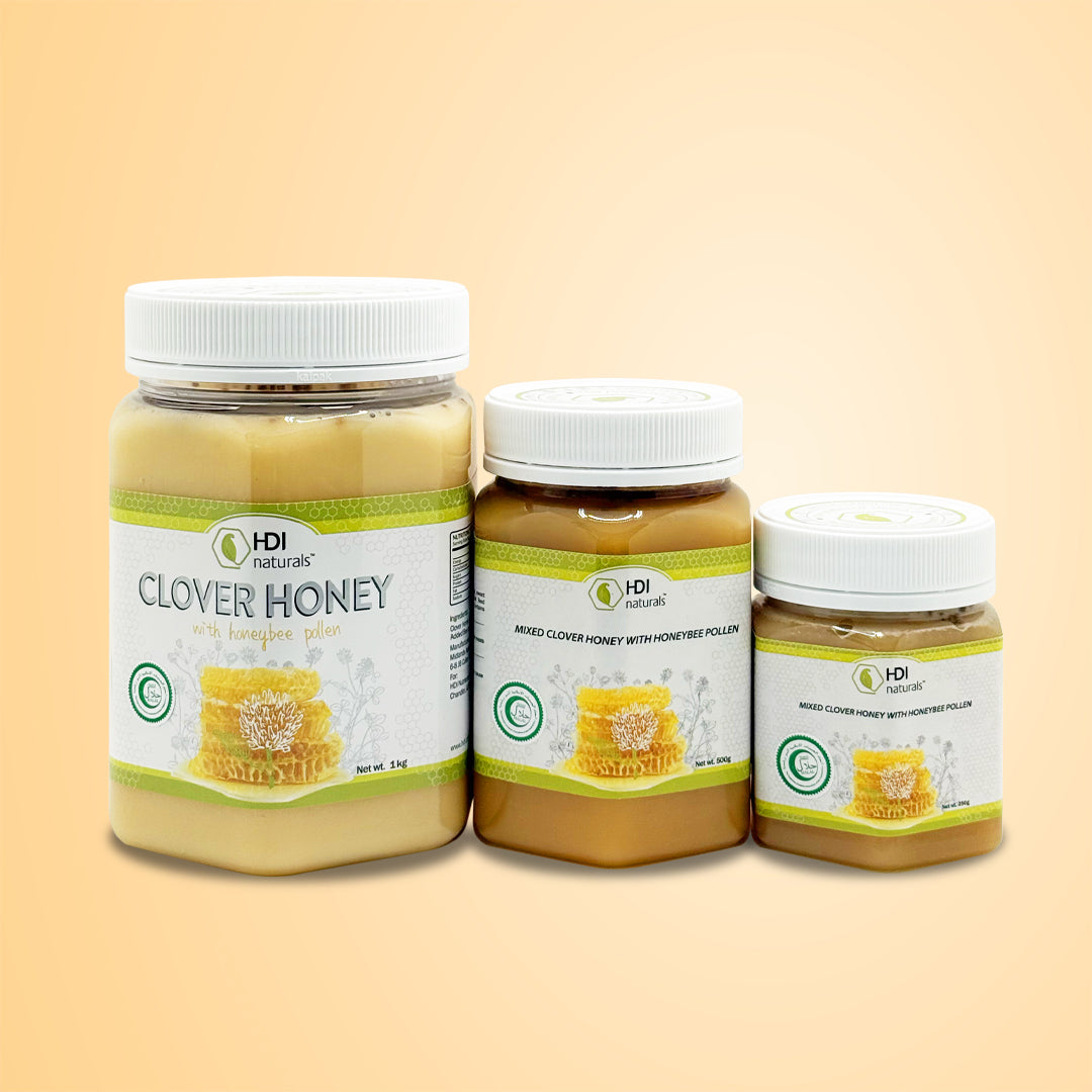 Three jars of HDI Naturals Clover Honey with Bee Pollen in 1kg, 500g, and 250g sizes. A pure, enzyme-rich, and unprocessed raw honey for gut health and bloating relief.